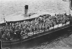 RAF personnel aboard a lighter, Oosthaven February 1942